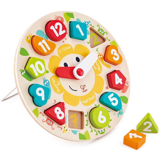child playing with Hape Chunky Clock Puzzle, learning numbers and time, available from the best online toy shop in Qatar with reliable toy delivery service