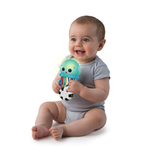 Baby playing with Ocean Glow Sensory Shaker – best online toy shop in Qatar