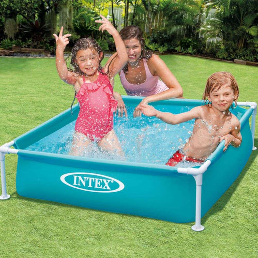 Kids enjoying the INTEX mini pool for toddlers with water splashes in a backyard setting