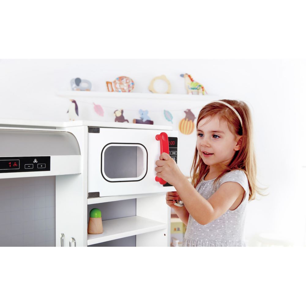 Best toy shop in Qatar ,Hape All In 1 Kitchen with accessories like pots, pans, and vegetables for imaginative cooking play, perfect to buy kids toys online in Qatar from the best toy shop with toy delivery service in Qatar.