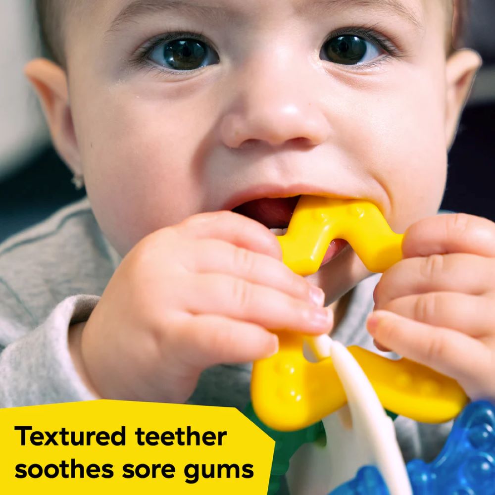 Baby playing with Baby Einstein teether set 