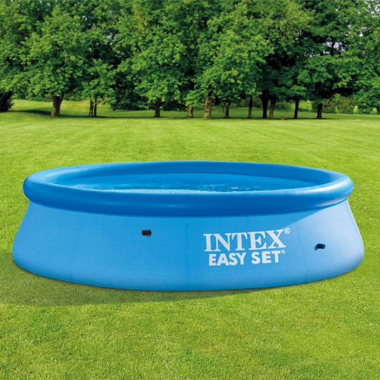 Intex inflatable swimming pool in blue set up on a grassy area for summer enjoyment